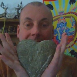 This serpentine natural stone heart washed up to my feet from the ocean.