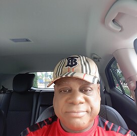 A picture of me. In my Burberry baseball cap