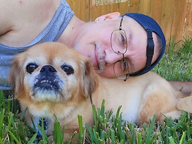 Me with our fur daughter, Ginger